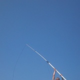 antenna set-up on a huge bale of straw
